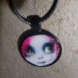 Doll face necklace